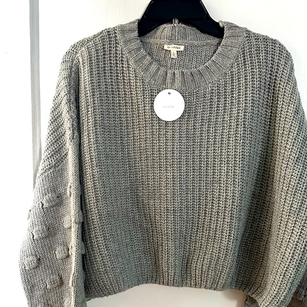 Beautiful Sweater brand new just in time for the fall.  Size Large.